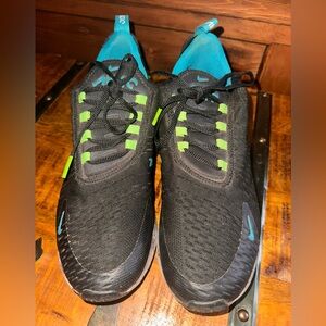 Nike Black and Green Athletic Shoes with Mesh Upper